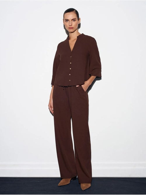 Pantaloni in crêpe a gamba ampia da donna - Kiabi