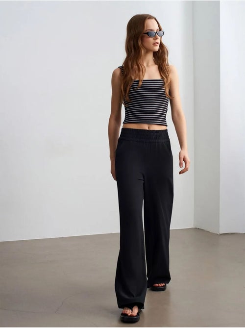 Pantaloni in crêpe a gamba ampia da donna - Kiabi Pantaloni in crêpe a gamba ampia da donna - Kiabi