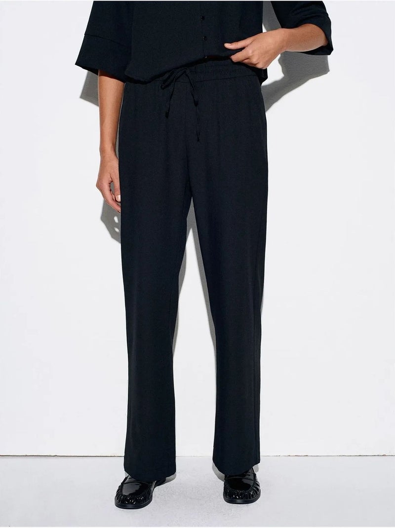 Pantaloni in crêpe a gamba ampia da donna Nero - Kiabi