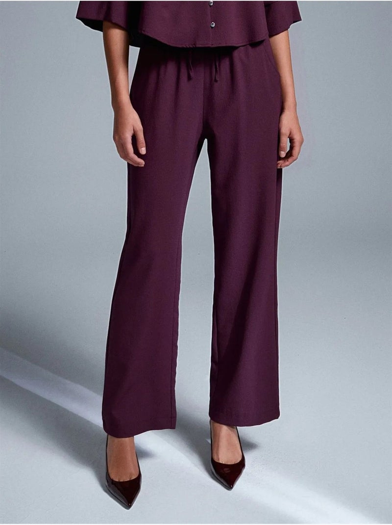 Pantaloni in crêpe a gamba ampia da donna Rosso bordeaux - Kiabi