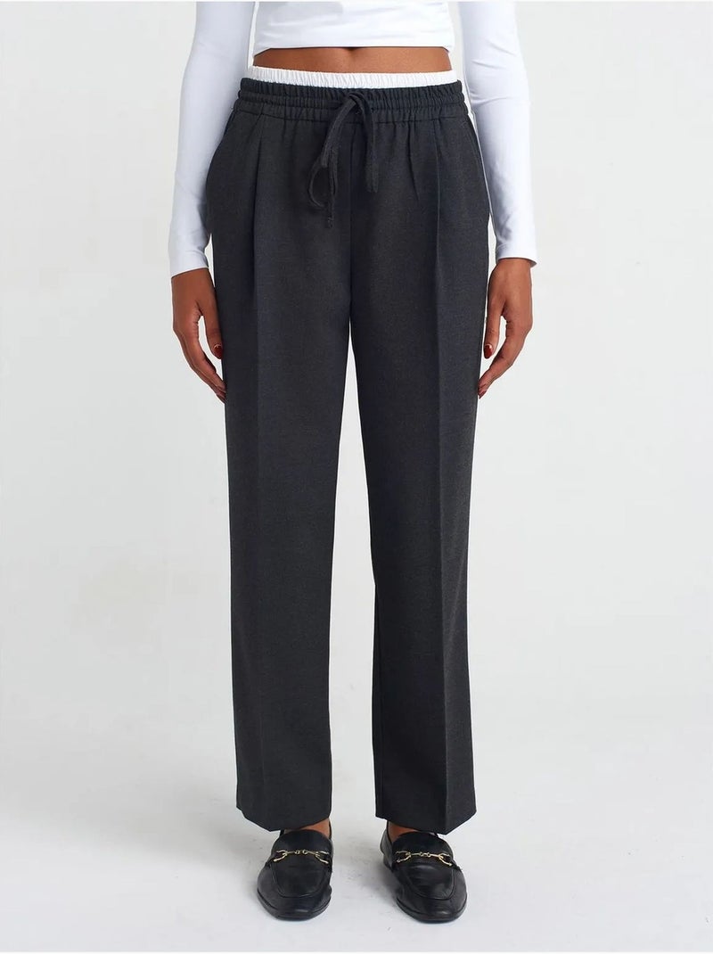 Pantaloni in crêpe a gamba ampia dilvin Grigio nero - Kiabi
