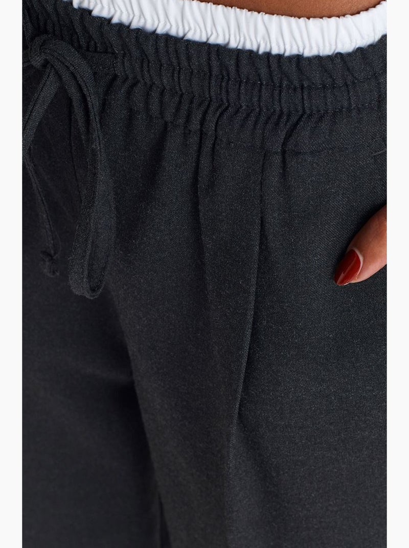 Pantaloni in crêpe a gamba ampia dilvin Grigio nero - Kiabi