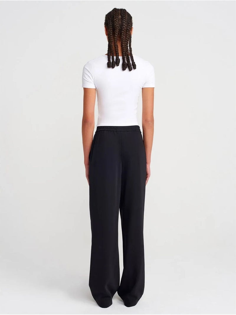 Pantaloni in crêpe a gamba ampia Nero - Kiabi
