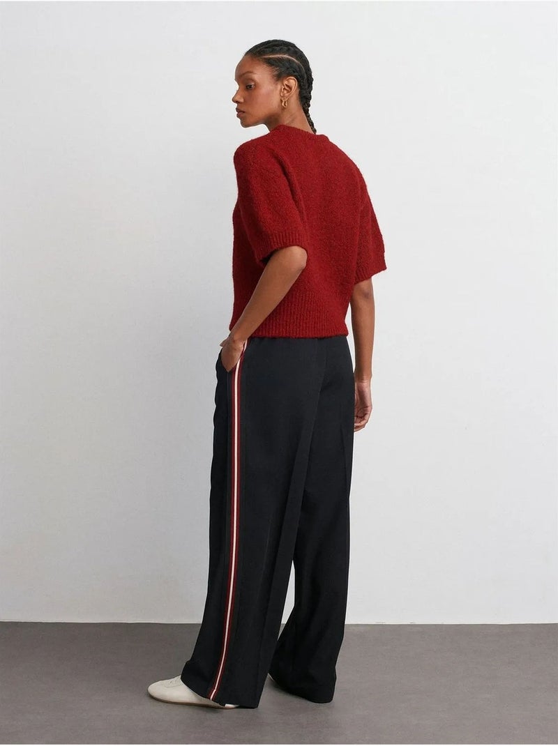 Pantaloni in crêpe a righe a gamba ampia dilvin Nero - Kiabi