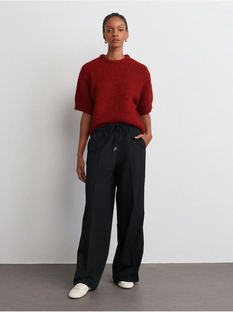 Pantaloni in crêpe a righe a gamba ampia dilvin Nero - Kiabi