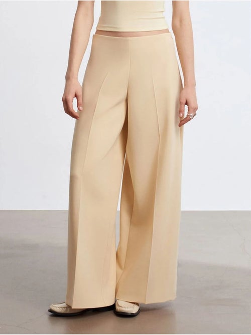 Pantaloni in crêpe a vita alta a gamba ampia - Kiabi Pantaloni in crêpe a vita alta a gamba ampia - Kiabi
