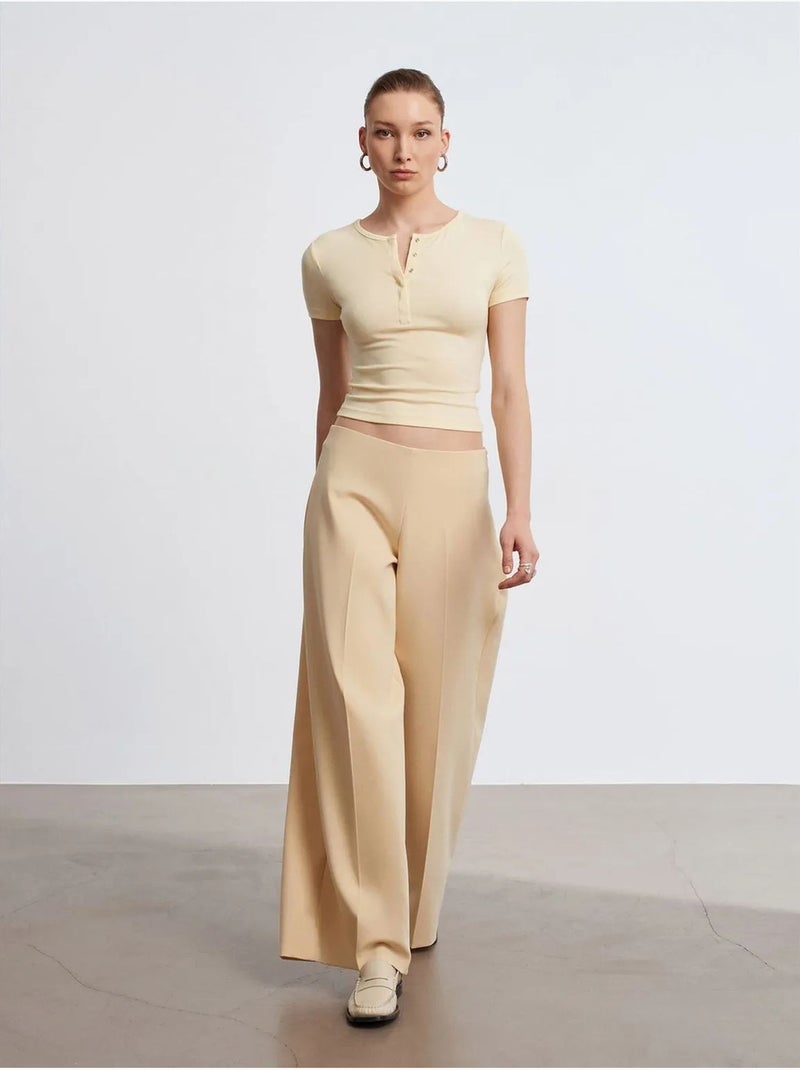 Pantaloni in crêpe a vita alta a gamba ampia Beige - Kiabi