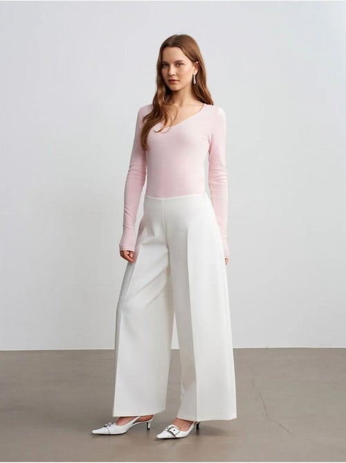 Pantaloni in crêpe a vita alta a gamba ampia - Kiabi Pantaloni in crêpe a vita alta a gamba ampia - Kiabi