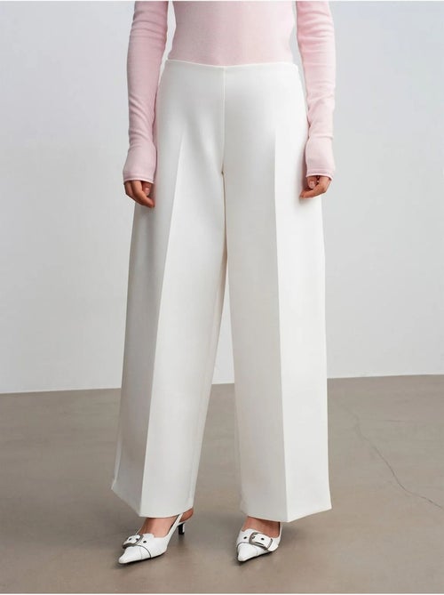 Pantaloni in crêpe a vita alta a gamba ampia - Kiabi Pantaloni in crêpe a vita alta a gamba ampia - Kiabi