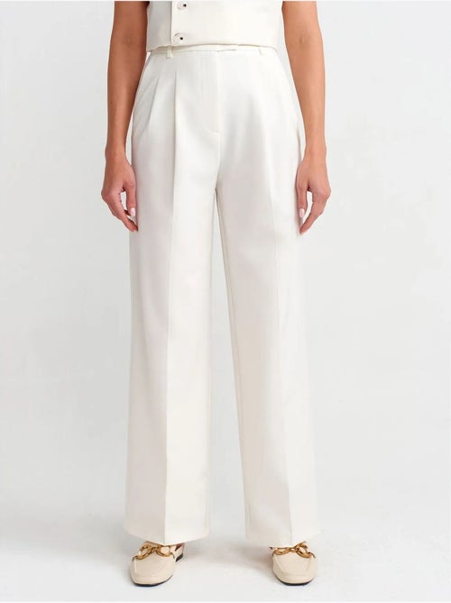 Pantaloni in crêpe a vita alta a gamba ampia con cintura dilvin - Kiabi Pantaloni in crêpe a vita alta a gamba ampia con cintura dilvin - Kiabi