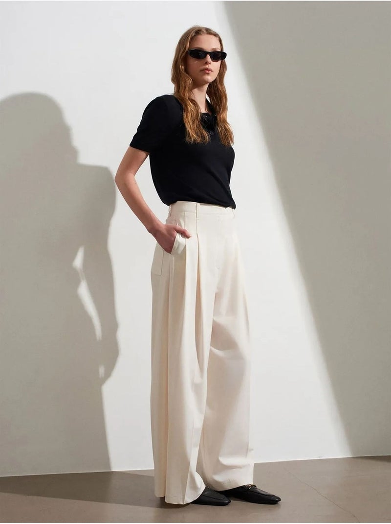 Pantaloni in crêpe a vita alta a gamba ampia da donna dilvin Crema - Kiabi