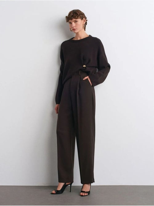 Pantaloni in crêpe a vita alta a gamba ampia - Kiabi Pantaloni in crêpe a vita alta a gamba ampia - Kiabi