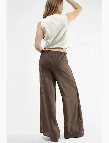Pantaloni in crêpe con vita a coulisse e dettaglio con laccio busem