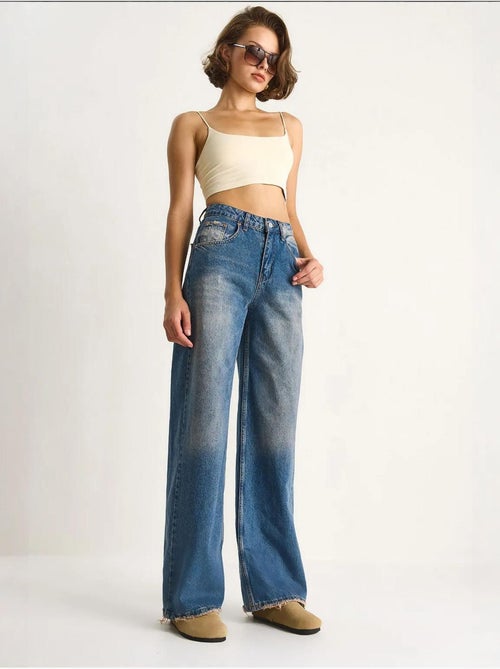 Pantaloni in denim a vita alta a gamba larga lucci - Kiabi Pantaloni in denim a vita alta a gamba larga lucci - Kiabi