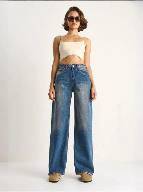 Pantaloni in denim a vita alta a gamba larga lucci - Kiabi Pantaloni in denim a vita alta a gamba larga lucci - Kiabi