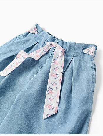 Pantaloni in denim con cintura floreale e vita paperbag
