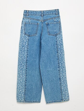 Pantaloni in denim con inserti stampati