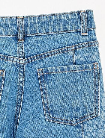 Pantaloni in denim con inserti stampati