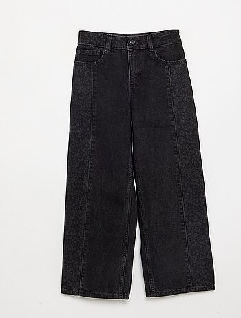 Pantaloni in denim con inserti stampati