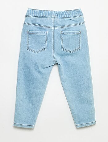 Pantaloni in denim con risvolto alla base