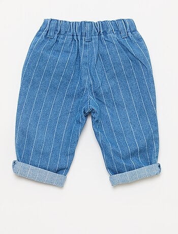 Pantaloni in denim con tasche applicate fantasiose