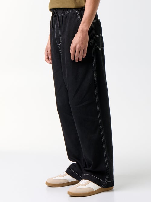 Pantaloni in denim con vita elasticizzata - Kiabi Pantaloni in denim con vita elasticizzata - Kiabi