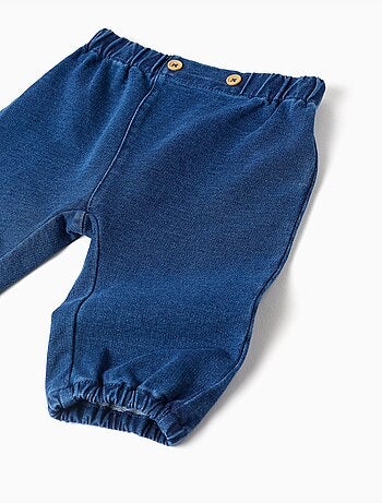 Pantaloni in denim di cotone con bottoni decorativi