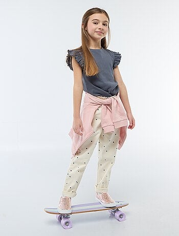 Pantaloni in denim taglio mom con motivo