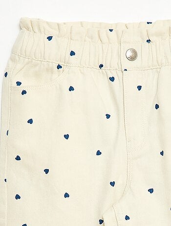 Pantaloni in denim taglio mom con motivo