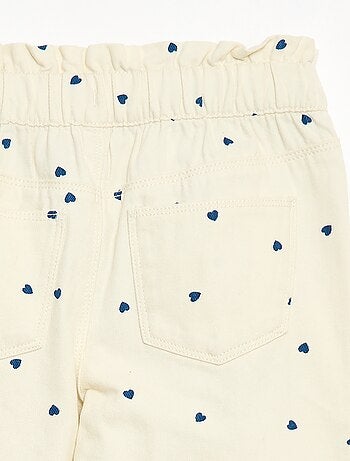 Pantaloni in denim taglio mom con motivo