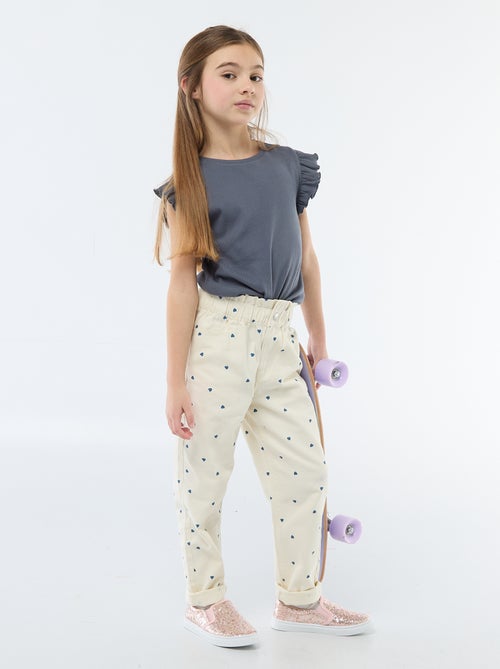 Pantaloni in denim taglio mom con motivo - Kiabi
