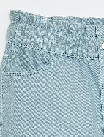 Pantaloni in denim taglio mom con motivo