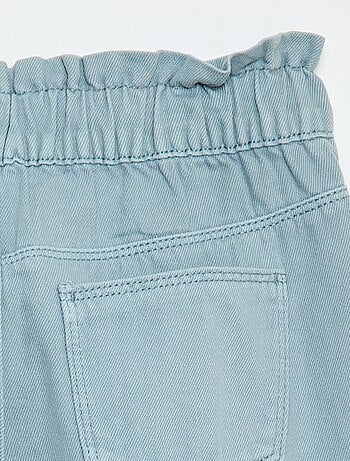 Pantaloni in denim taglio mom con motivo