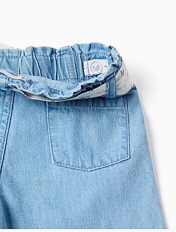 Pantaloni in jeans a gamba larga con cintura floreale