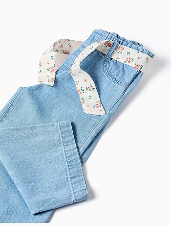 Pantaloni in jeans a gamba larga con cintura floreale