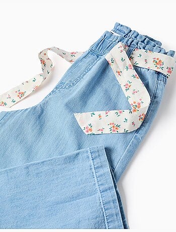 Pantaloni in jeans a gamba larga con cintura floreale