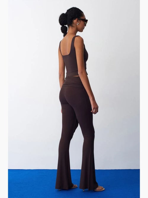 Pantaloni in jersey a zampa a vita alta con dettaglio a laccetto dilvin - Kiabi Pantaloni in jersey a zampa a vita alta con dettaglio a laccetto dilvin - Kiabi