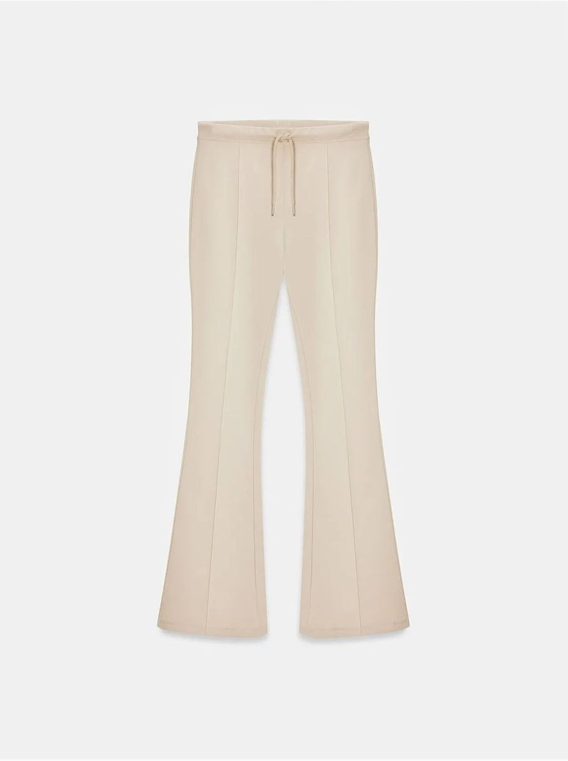 Pantaloni in jersey a zampa a vita media con coulisse dilvin Beige argilla - Kiabi