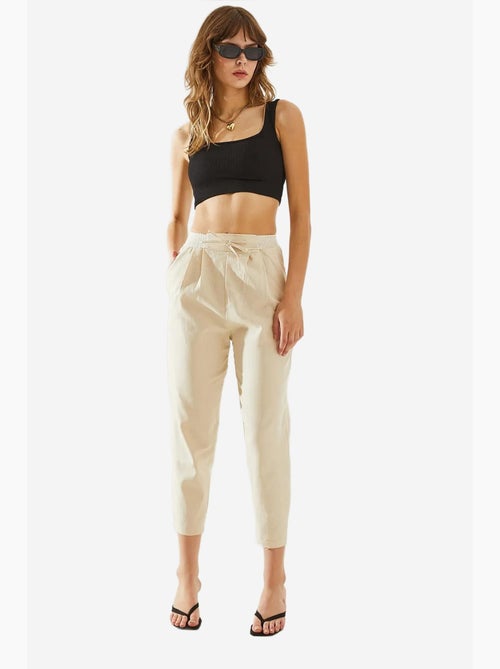 Pantaloni in lino a spina di pesce con dettaglio in vita lucci - Kiabi Pantaloni in lino a spina di pesce con dettaglio in vita lucci - Kiabi
