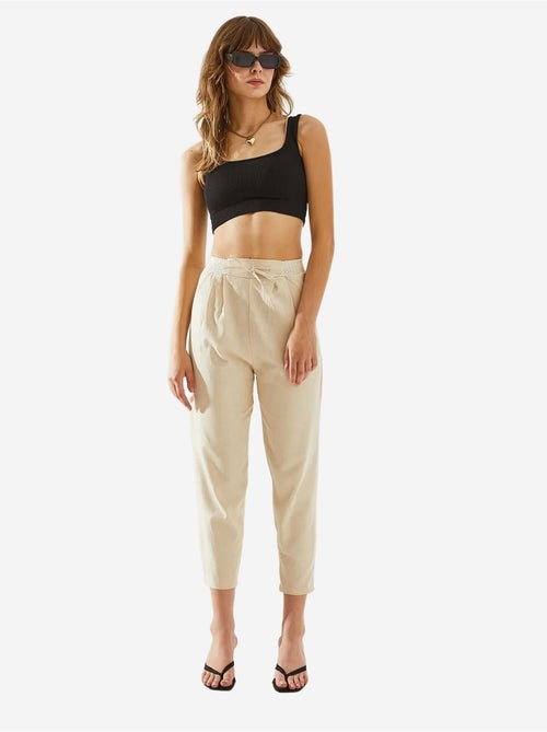 Pantaloni in lino a spina di pesce con dettaglio in vita lucci - Kiabi Pantaloni in lino a spina di pesce con dettaglio in vita lucci - Kiabi