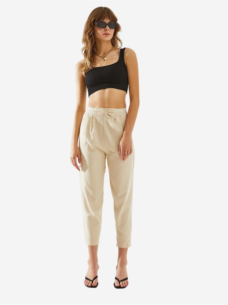 Pantaloni in lino a spina di pesce con dettaglio in vita lucci Bianco sporco - Kiabi