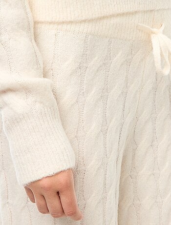Pantaloni in maglia a trecce