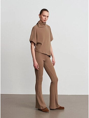 Pantaloni in maglia a zampa a vita alta