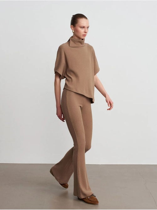 Pantaloni in maglia a zampa a vita alta - Kiabi Pantaloni in maglia a zampa a vita alta - Kiabi