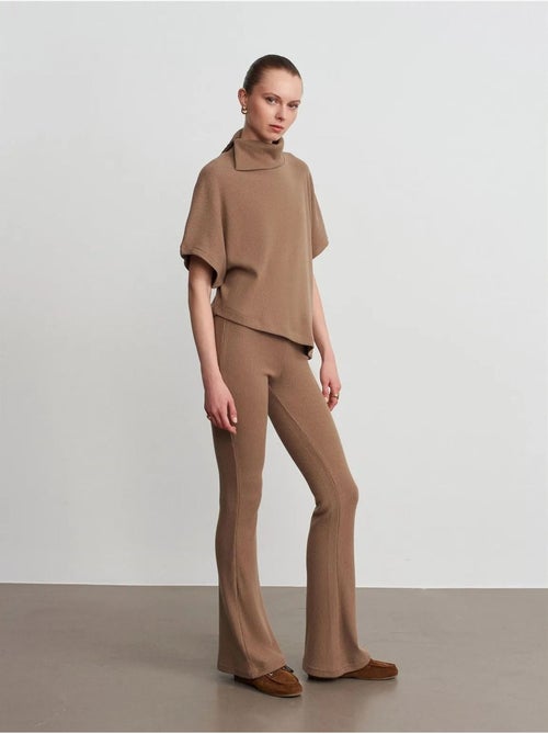 Pantaloni in maglia a zampa a vita alta - Kiabi Pantaloni in maglia a zampa a vita alta - Kiabi