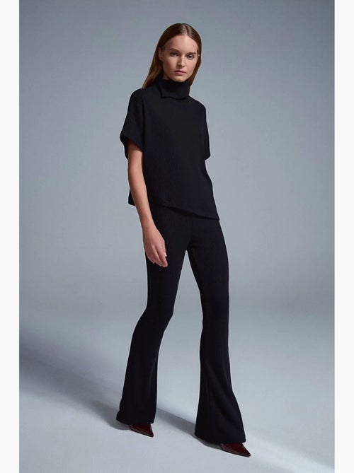 Pantaloni in maglia a zampa a vita alta dilvin - Kiabi Pantaloni in maglia a zampa a vita alta dilvin - Kiabi