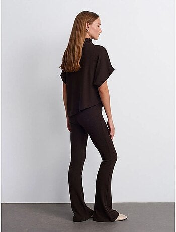 Pantaloni in maglia a zampa a vita alta