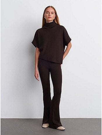 Pantaloni in maglia a zampa a vita alta