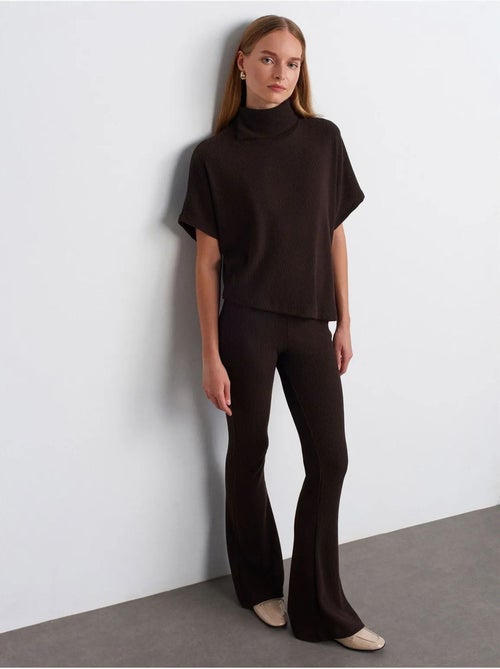Pantaloni in maglia a zampa a vita alta - Kiabi Pantaloni in maglia a zampa a vita alta - Kiabi