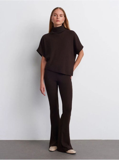 Pantaloni in maglia a zampa a vita alta - Kiabi Pantaloni in maglia a zampa a vita alta - Kiabi